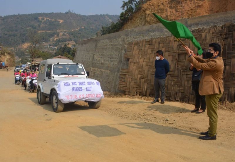 ADC, Mon HQ, Rahul Mali, IAS flagging off the Awareness Scooty Rally at Mon on February 15. (DIPR Photo) 